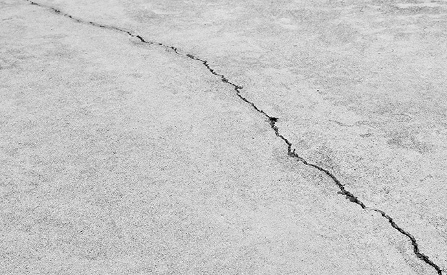 Unpolished concrete floor with crack